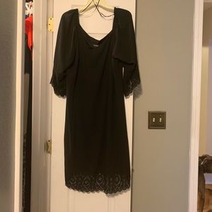 Adorable black dress with lace/eyelet design